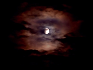 This awesome ... wicked bad ... photo of a tempestuous sky was taken by Brad Harrison of Pierceland, Canada and is entitled "Bad Moon Rising".